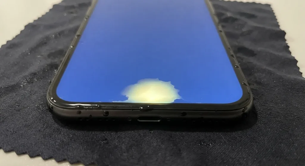 Heat, Cold, or Liquid Exposure
causing bright spot on phone screen